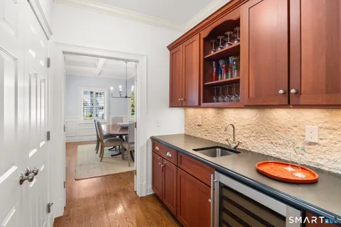 a kitchen with stainless steel appliances granite countertop a sink and cabinets