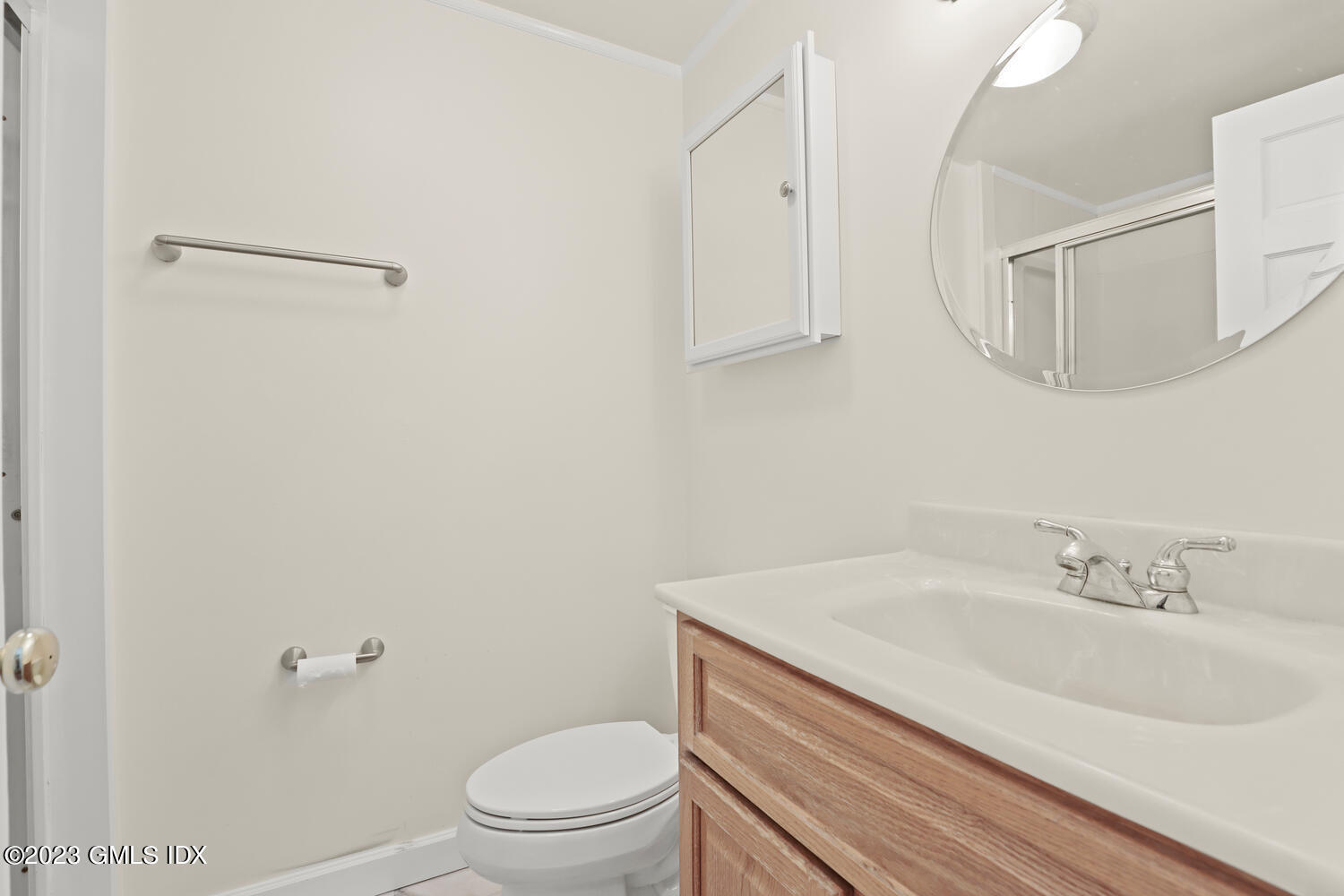 220 Sheep Hill Road, Unit 2 Riverside, CT 06878 - Photo 12 of 20 a bathroom with a sink a toilet and vanity