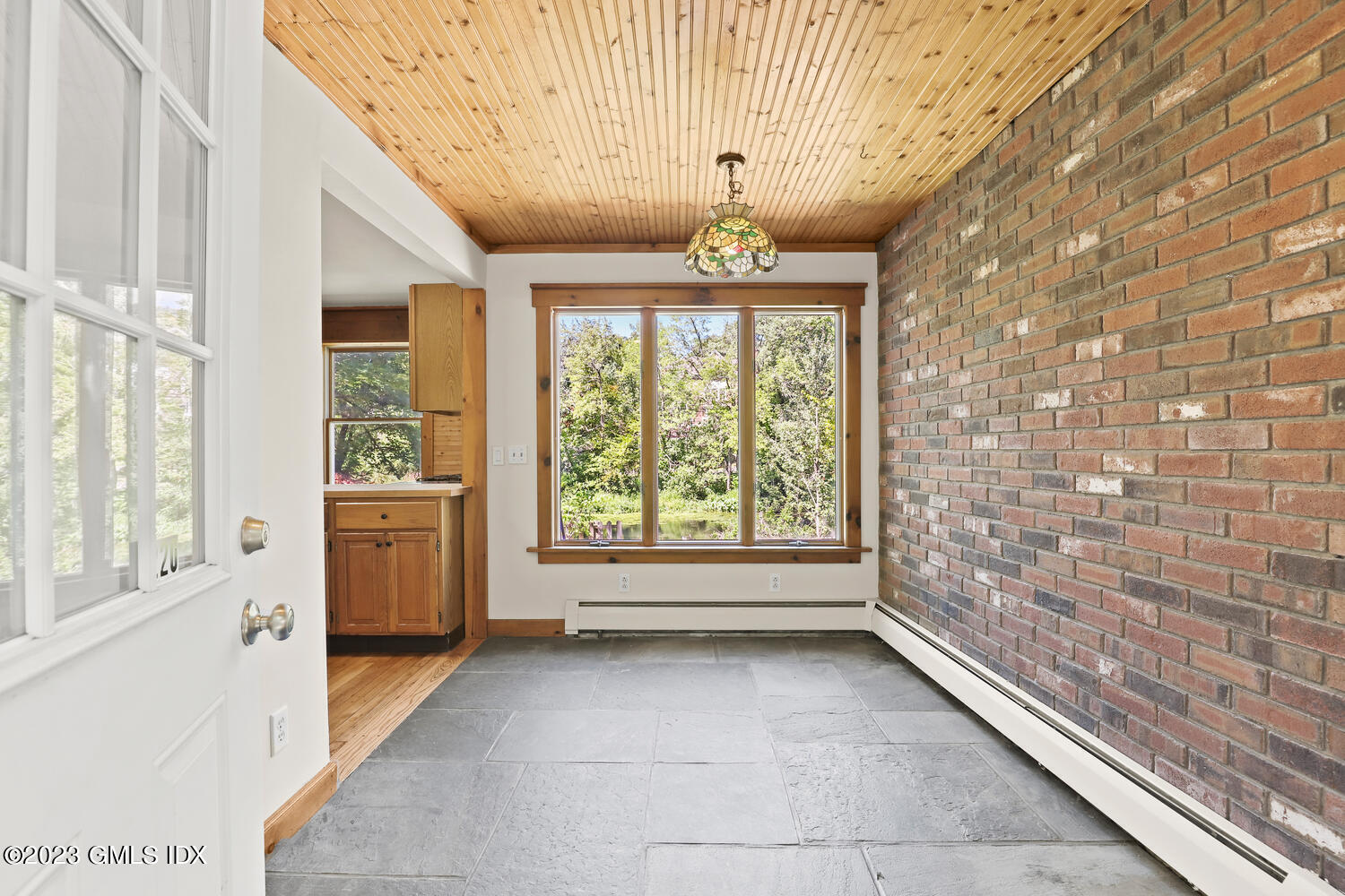 220 Sheep Hill Road, Unit 2 Riverside, CT 06878 - Photo 3 of 20 a view of entryway with a window