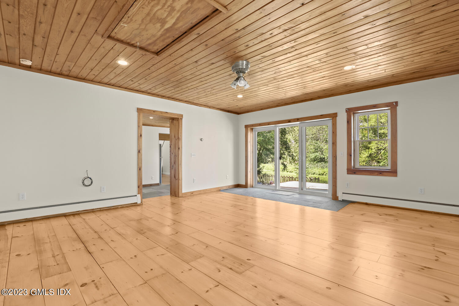 220 Sheep Hill Road, Unit 2 Riverside, CT 06878 - Photo 8 of 20 a view of an empty room with a window