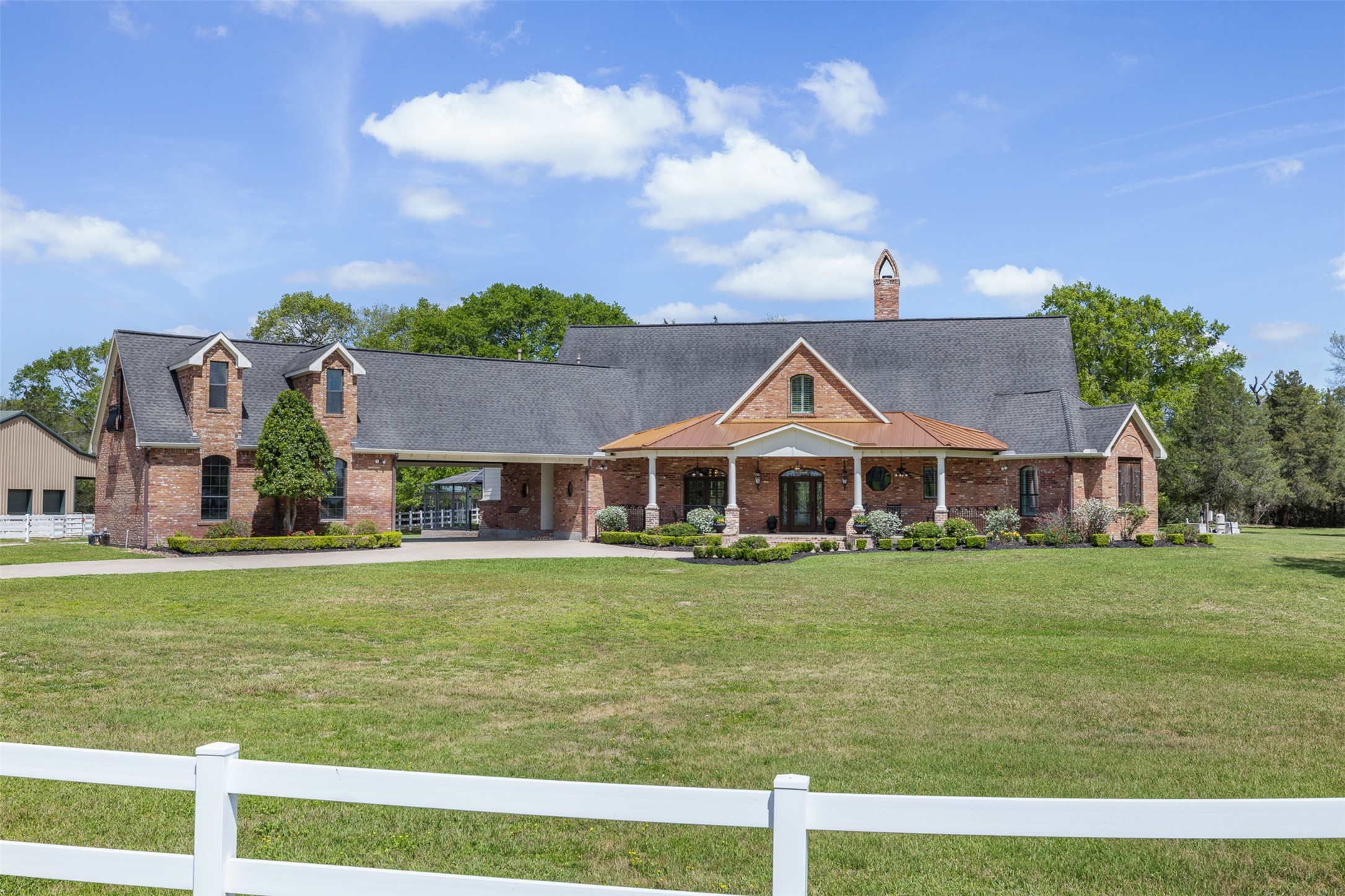 29500 Skymac Ranch Road Hempstead, TX 77445 - Photo 50 of 50 a front view of a house with a garden