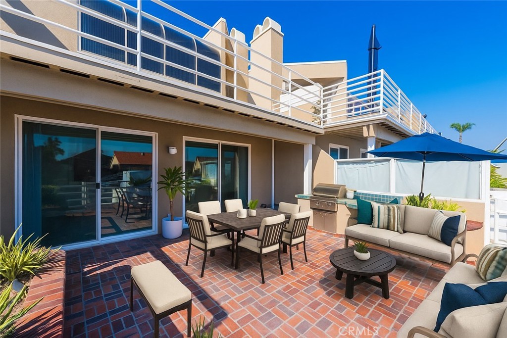 3310 Tempe Drive Huntington Beach, CA 92649 - Photo 12 of 52 a outdoor living space with patio furniture and a potted plant
