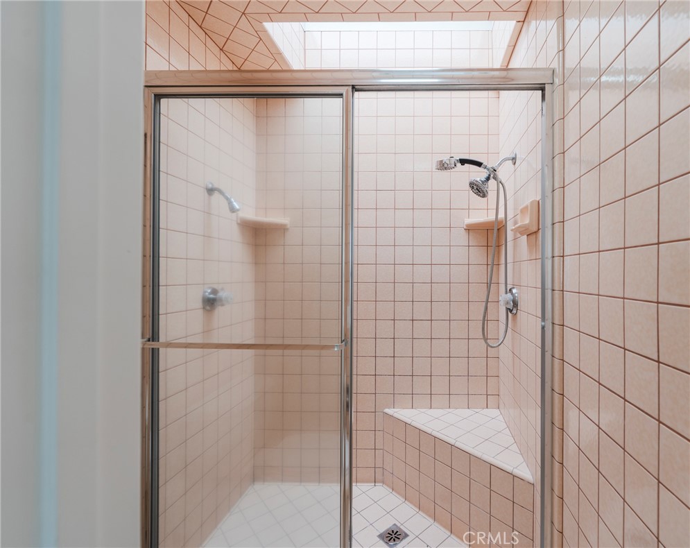 3310 Tempe Drive Huntington Beach, CA 92649 - Photo 26 of 52 a bathroom with a shower and a bathtub