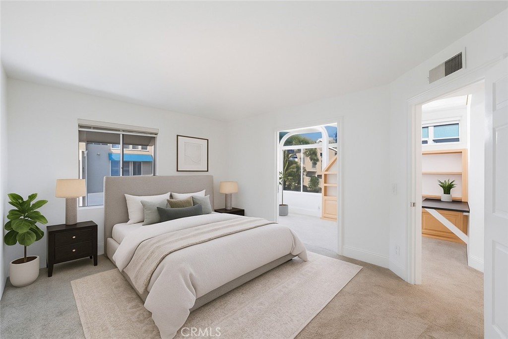 3310 Tempe Drive Huntington Beach, CA 92649 - Photo 27 of 52 a bedroom with a bed and a couch