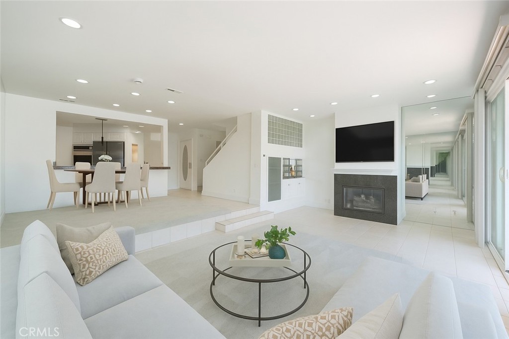 3310 Tempe Drive Huntington Beach, CA 92649 - Photo 3 of 52 a living room with furniture and a flat screen tv