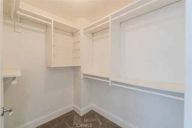 a view of a lake with outdoor seating