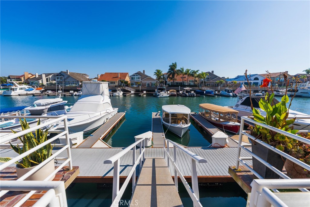 3310 Tempe Drive Huntington Beach, CA 92649 - Photo 34 of 52 a view of a chairs and table on the terrace