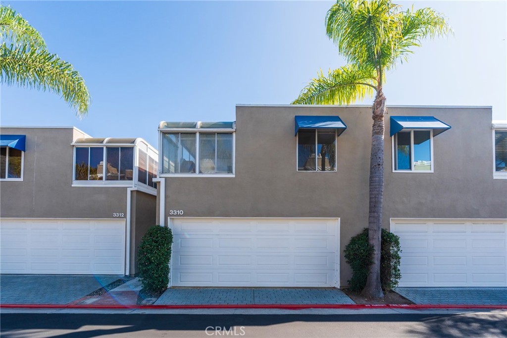 3310 Tempe Drive Huntington Beach, CA 92649 - Photo 38 of 52 a front view of a house with plants