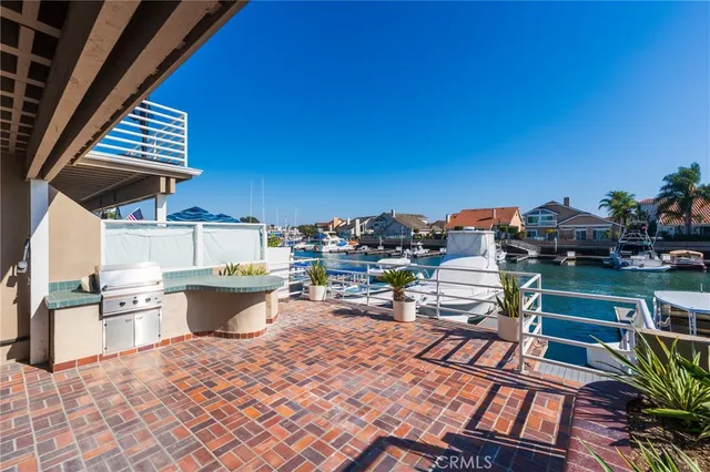 a view of a house with backyard sitting area