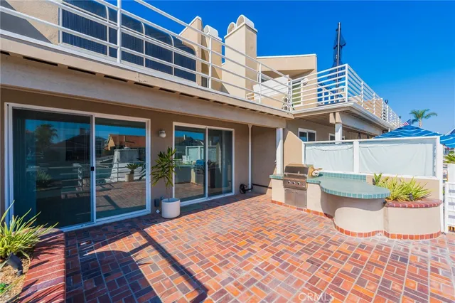 a view of a house with sitting area and furniture