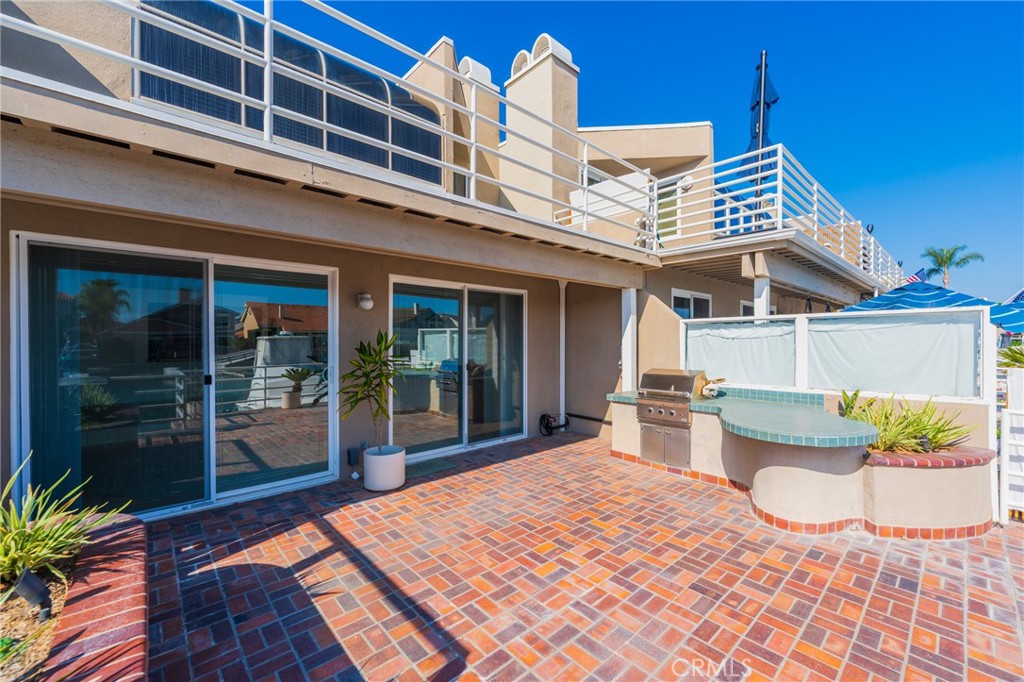 3310 Tempe Drive Huntington Beach, CA 92649 - Photo 9 of 52 a view of a house with a patio
