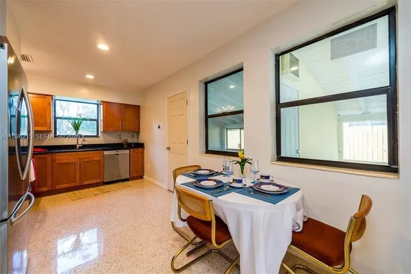 a kitchen with a sink cabinets and counter space