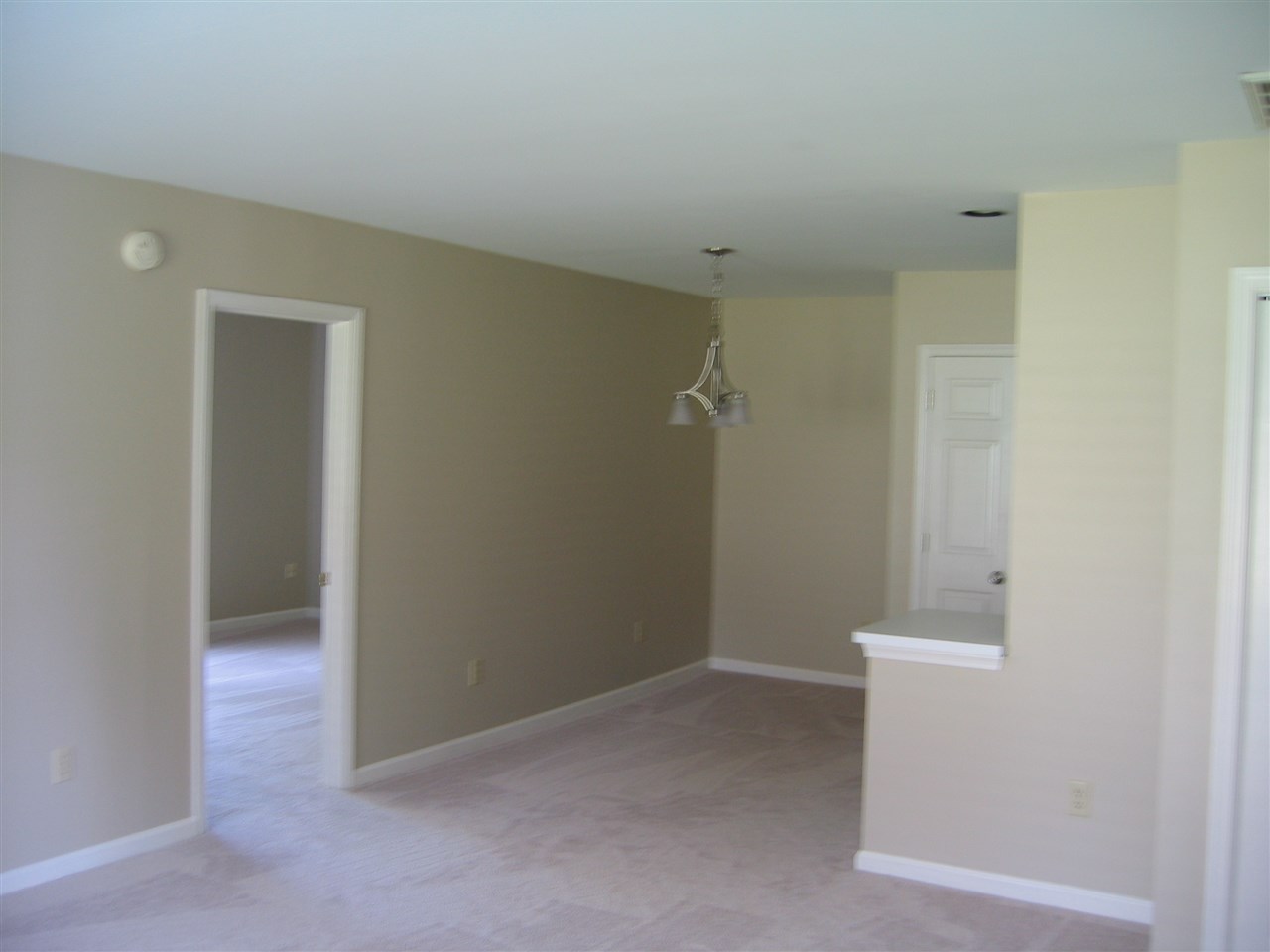 997 Amber Ridge Road Charlottesville, VA 22901 - Photo 5 of 18 an empty room with a hallway