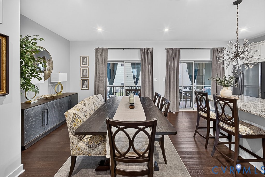 17976 Spotted Oak Road Dumfries, VA 22026 - Photo 13 of 52 Open-concept dining area featuring dark wood-finis