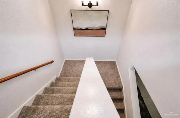 a view of hallway with stairs