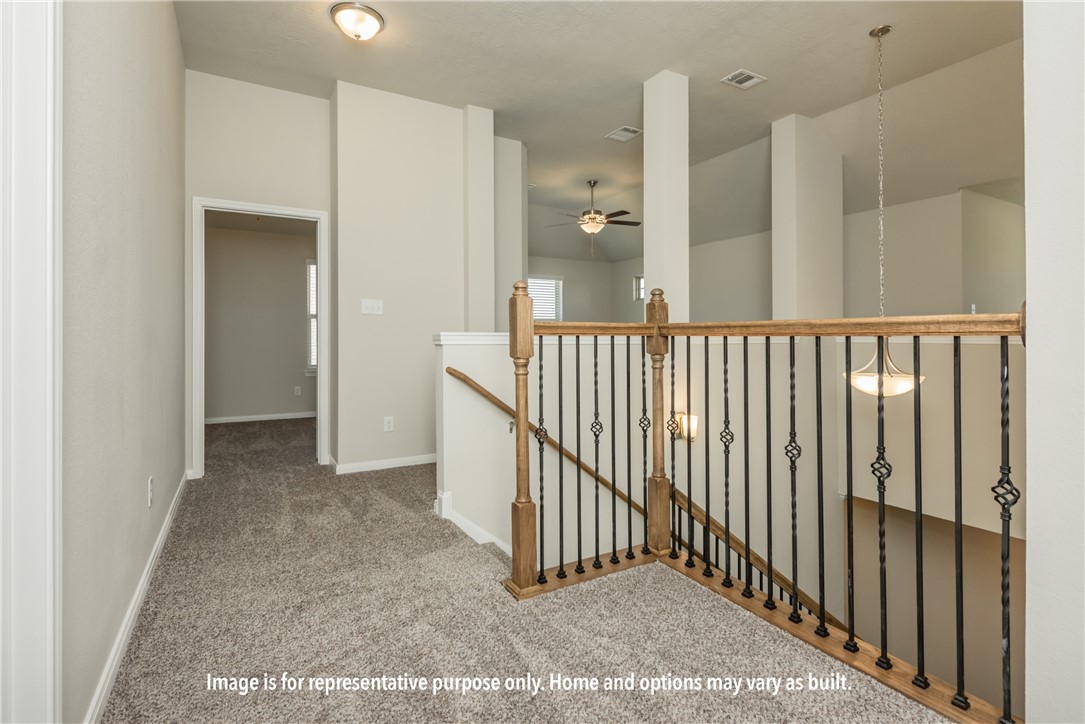 4832 Native Tree Lane Bryan, TX 77845 - Photo 6 of 8 a view of a hallway with a hallway