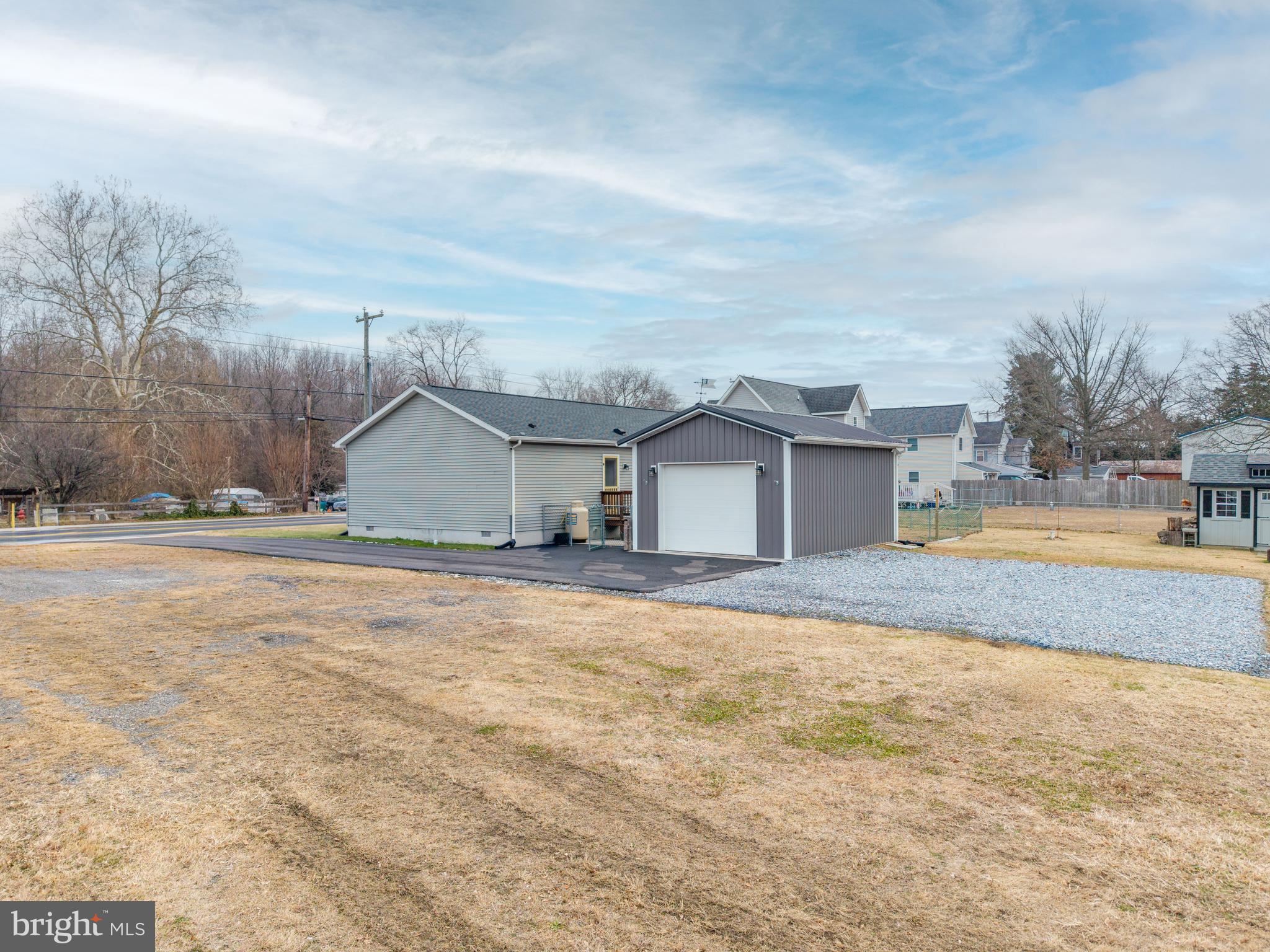 158 Main Street Hartly, DE 19953 - Photo 24 of 31 a view of a house with a yard and covered with snow
