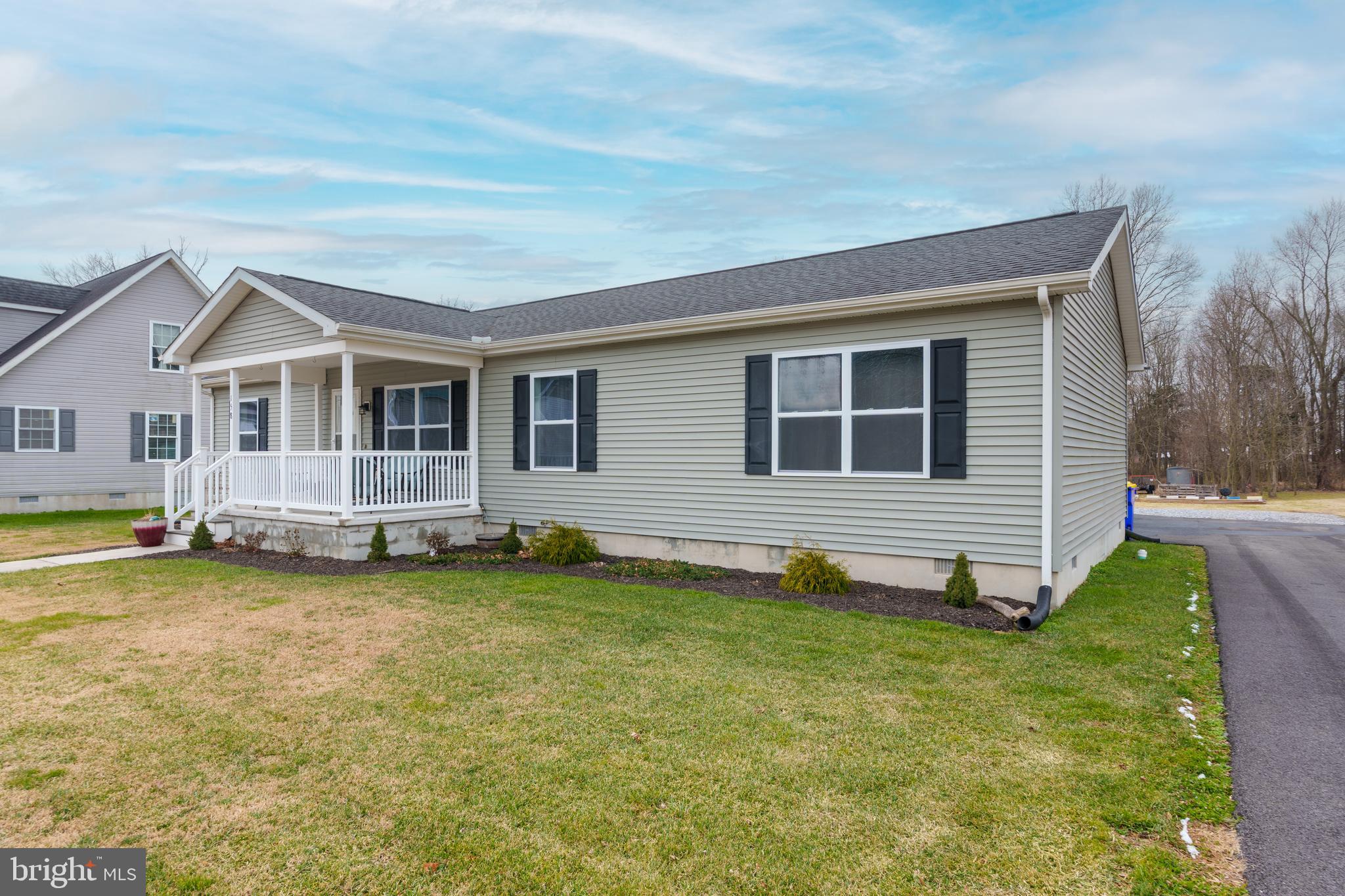 158 Main Street Hartly, DE 19953 - Photo 3 of 31 a view of a house with a yard and sitting area