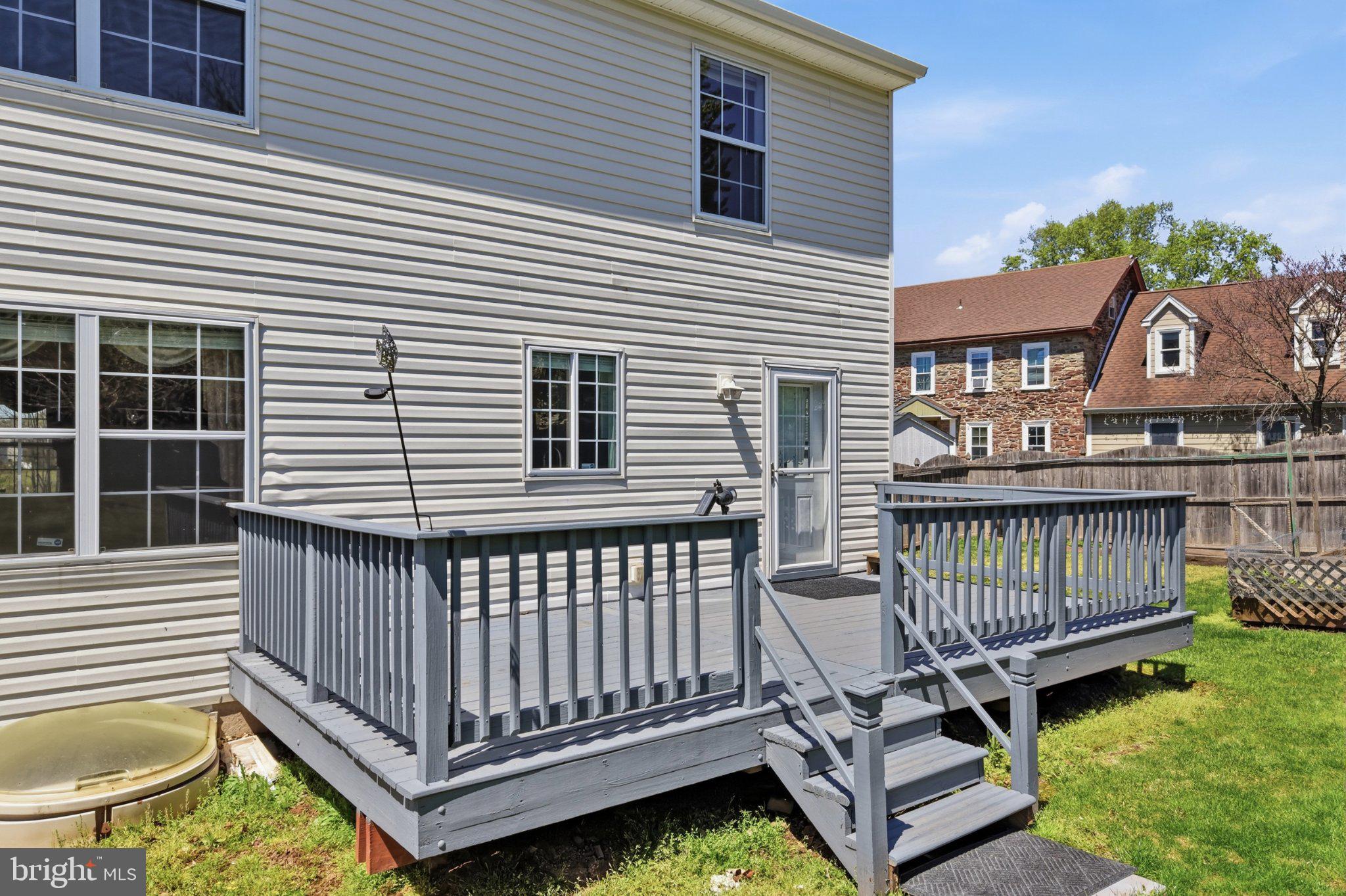 296 Alderfer Road Harleysville, PA 19438 - Photo 36 of 41 Charming backyard deck for relaxation.