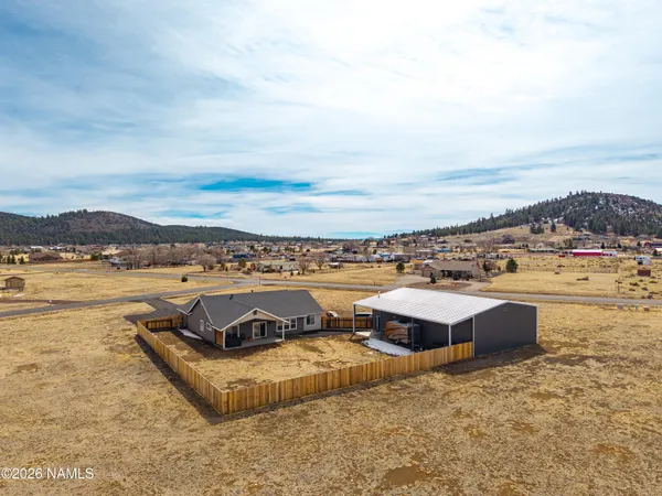 a view of a city with an ocean view