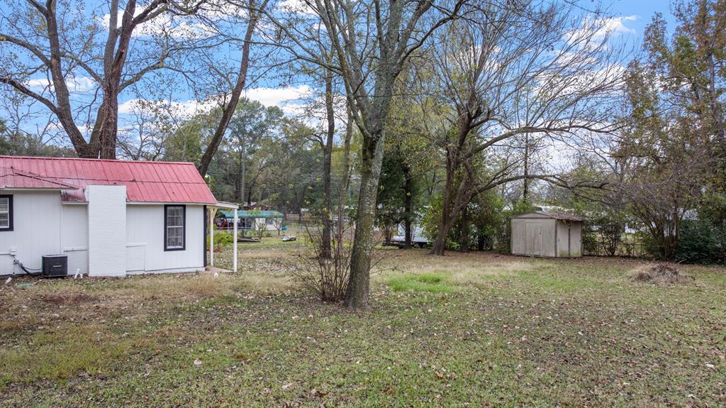 10474 Apache Street Wills Point, TX 75169 - Photo 7 of 29 a view of a house with a yard