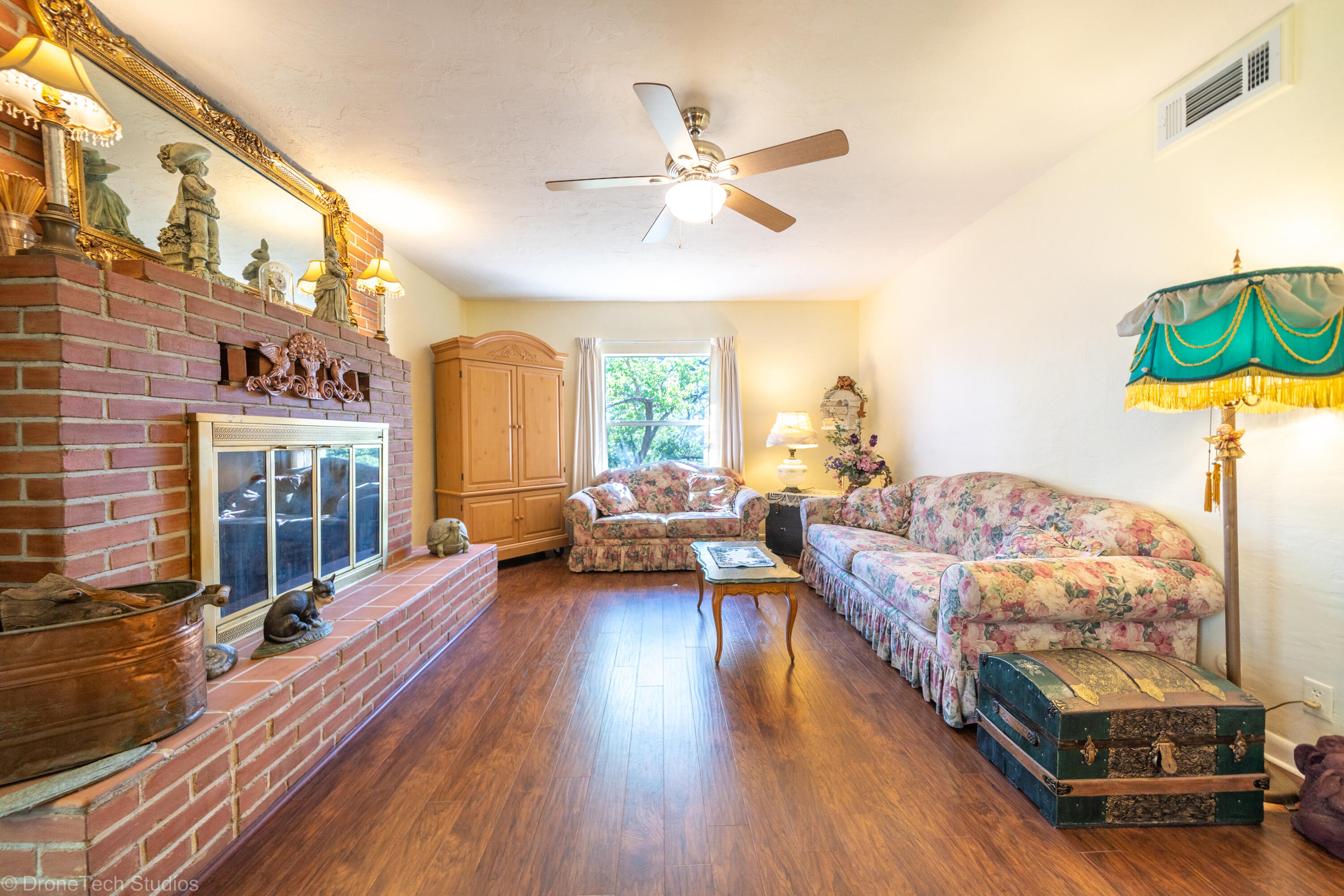 31250 2 Ponds Road Whitmore, CA 96096 - Photo 12 of 60 a living room with furniture and a large window