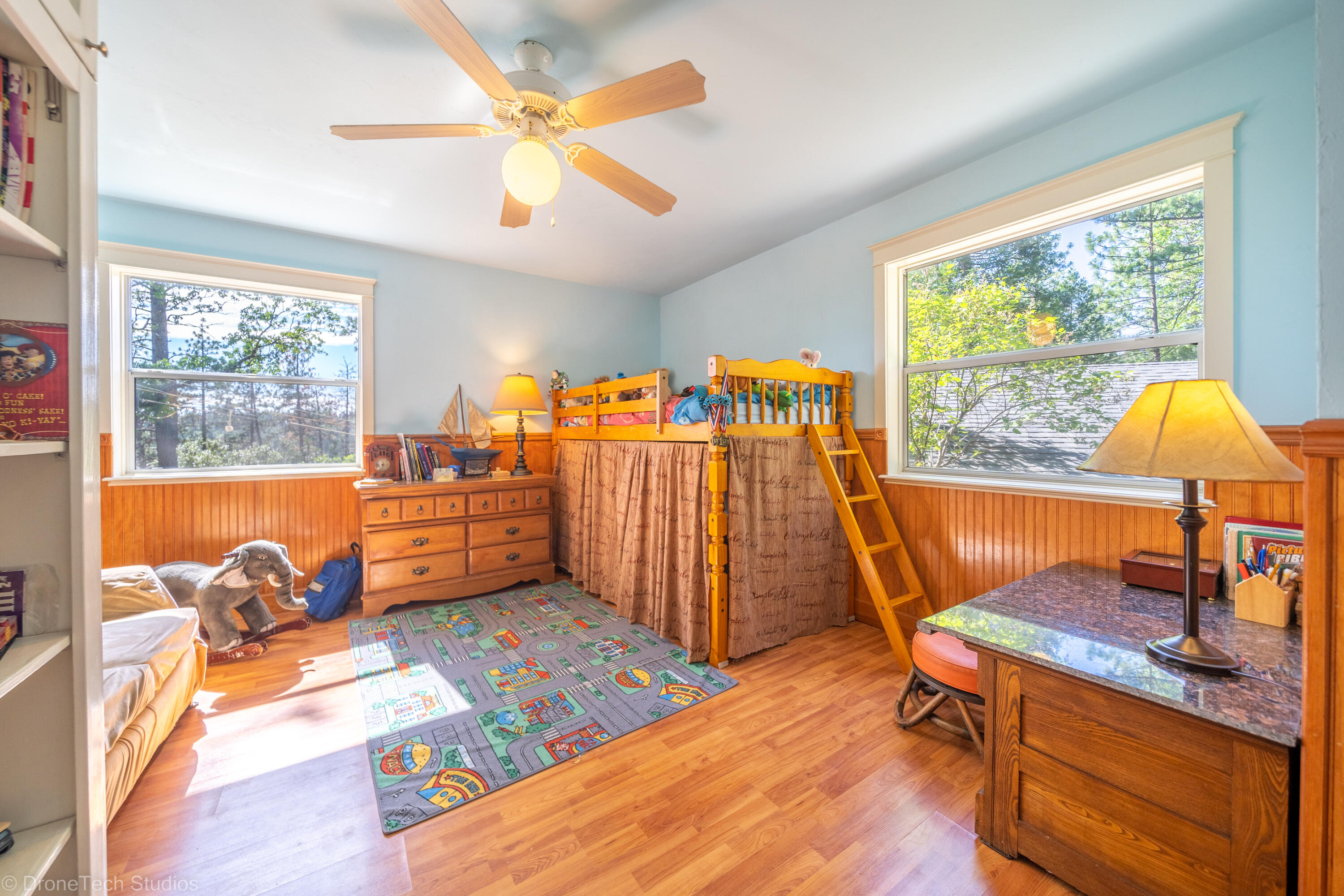 31250 2 Ponds Road Whitmore, CA 96096 - Photo 31 of 60 a bedroom with furniture and a window