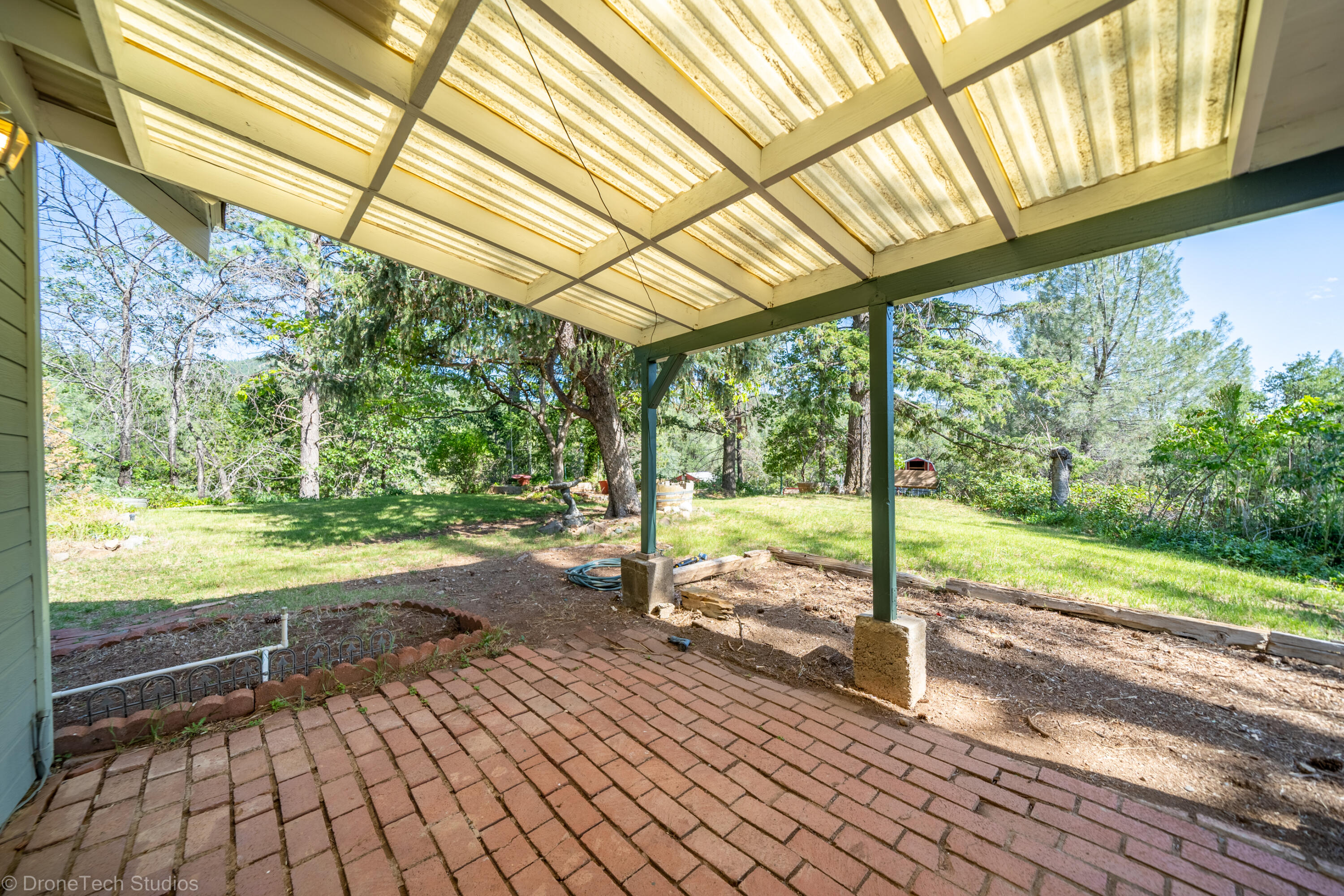 31250 2 Ponds Road Whitmore, CA 96096 - Photo 36 of 60 a view of a room with wooden floor and roof