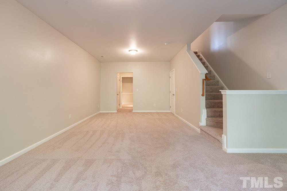7828 Spungold Street Raleigh, NC 27617 - Photo 13 of 30 Lower Level Family Room