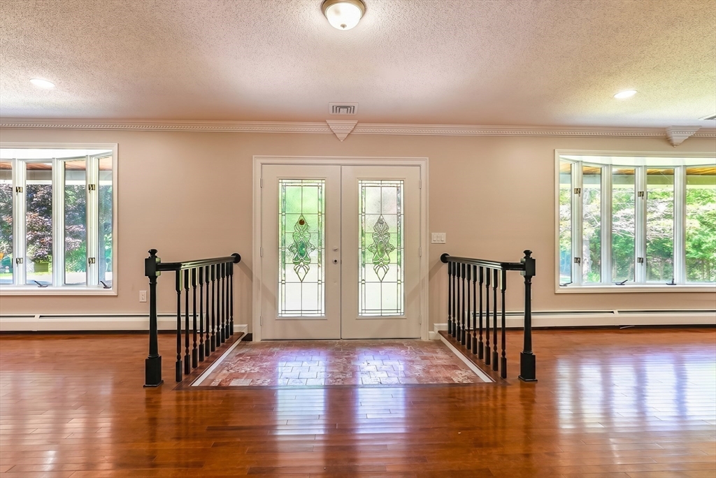 41 Watuppa Road Westport, MA 02790 - Photo 11 of 42 a view of a room with wooden floor and balcony