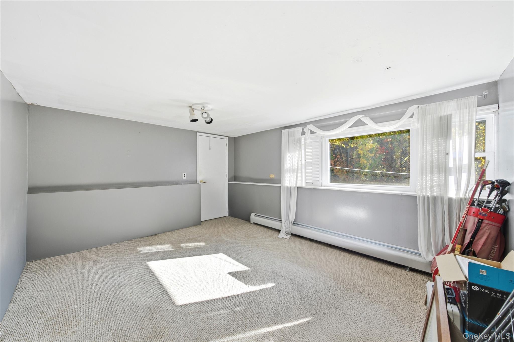 68 7th Street Bay Shore, NY 11706 - Photo 18 of 21 a view of an empty room with a window
