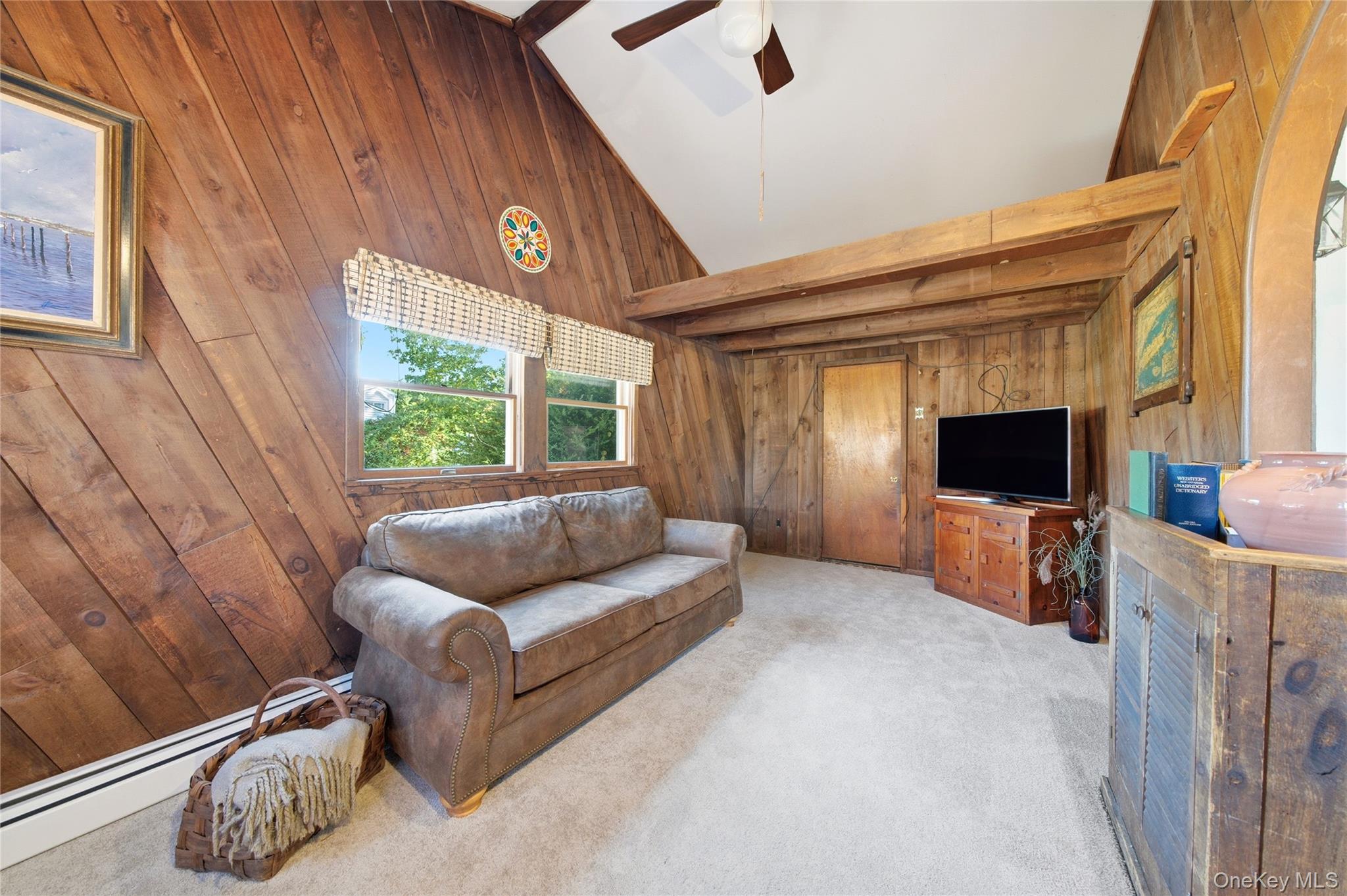 68 7th Street Bay Shore, NY 11706 - Photo 4 of 21 a living room with furniture and a fireplace