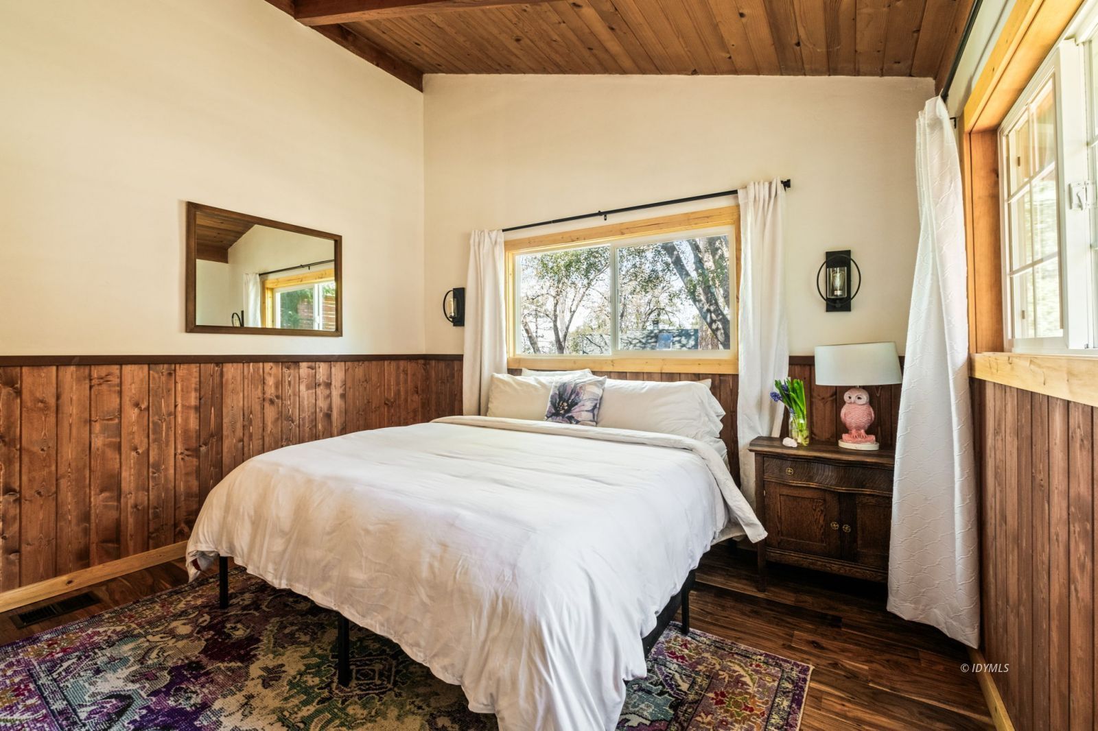 24750 Marion Ridge Drive Idyllwild, CA 92549 - Photo 26 of 45 a bedroom with a bed and a window