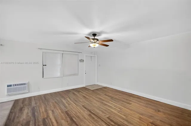 a bathroom with a toilet a sink and shower