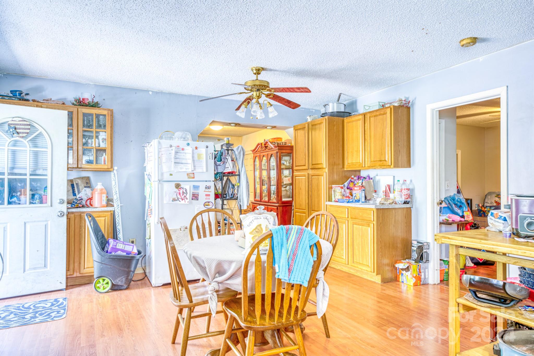 1 Westgate Road Asheville, NC 28806 - Photo 15 of 25 a dining room filled with furniture and a chandelier