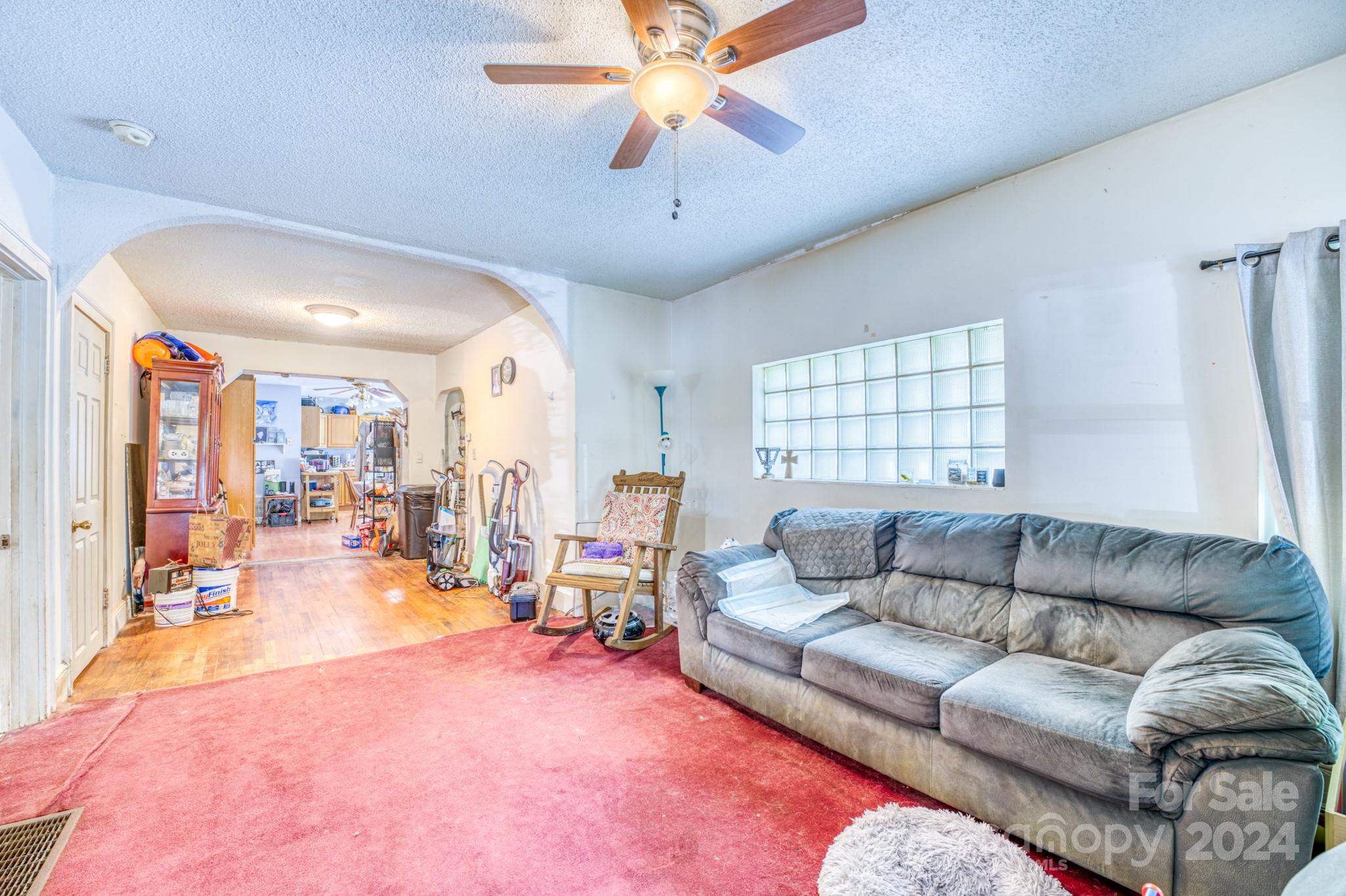 1 Westgate Road Asheville, NC 28806 - Photo 18 of 25 a living room with furniture and a large window
