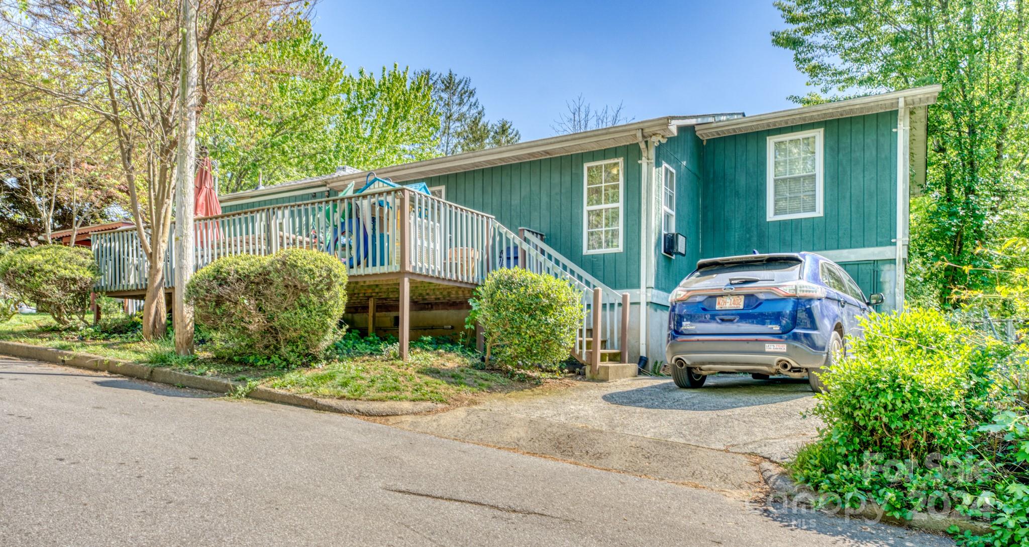 1 Westgate Road Asheville, NC 28806 - Photo 25 of 25 a front view of a house with garden