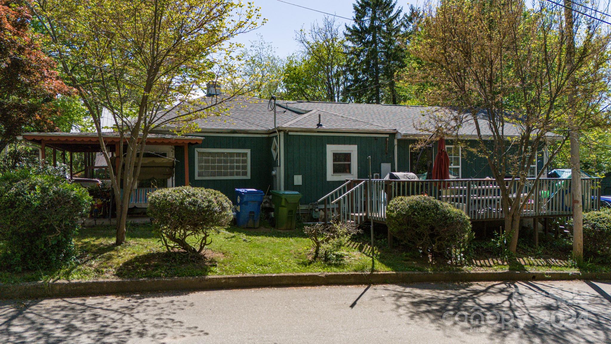 1 Westgate Road Asheville, NC 28806 - Photo 4 of 25 a front view of a house with garden