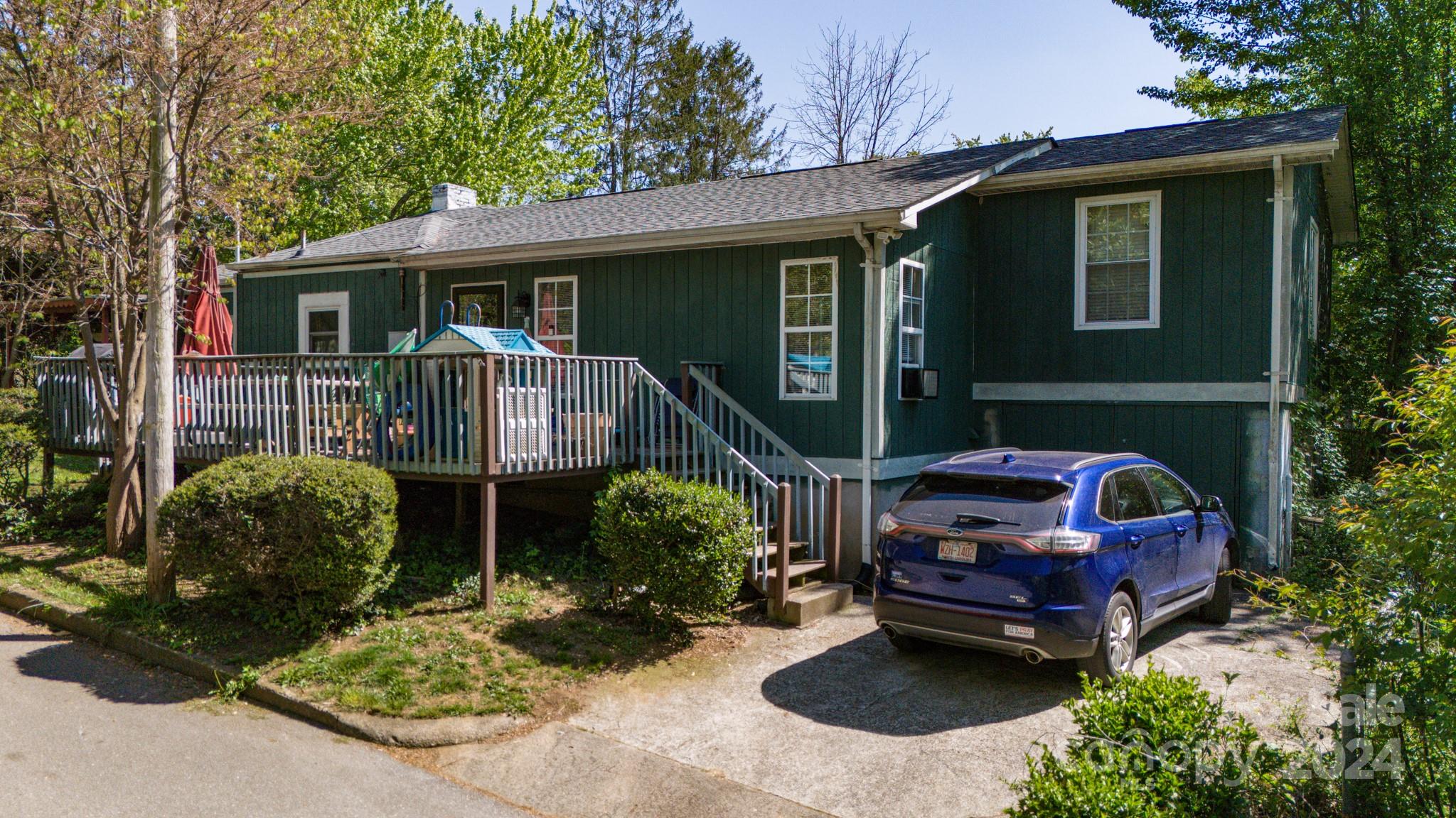 1 Westgate Road Asheville, NC 28806 - Photo 5 of 25 a front view of a house with patio