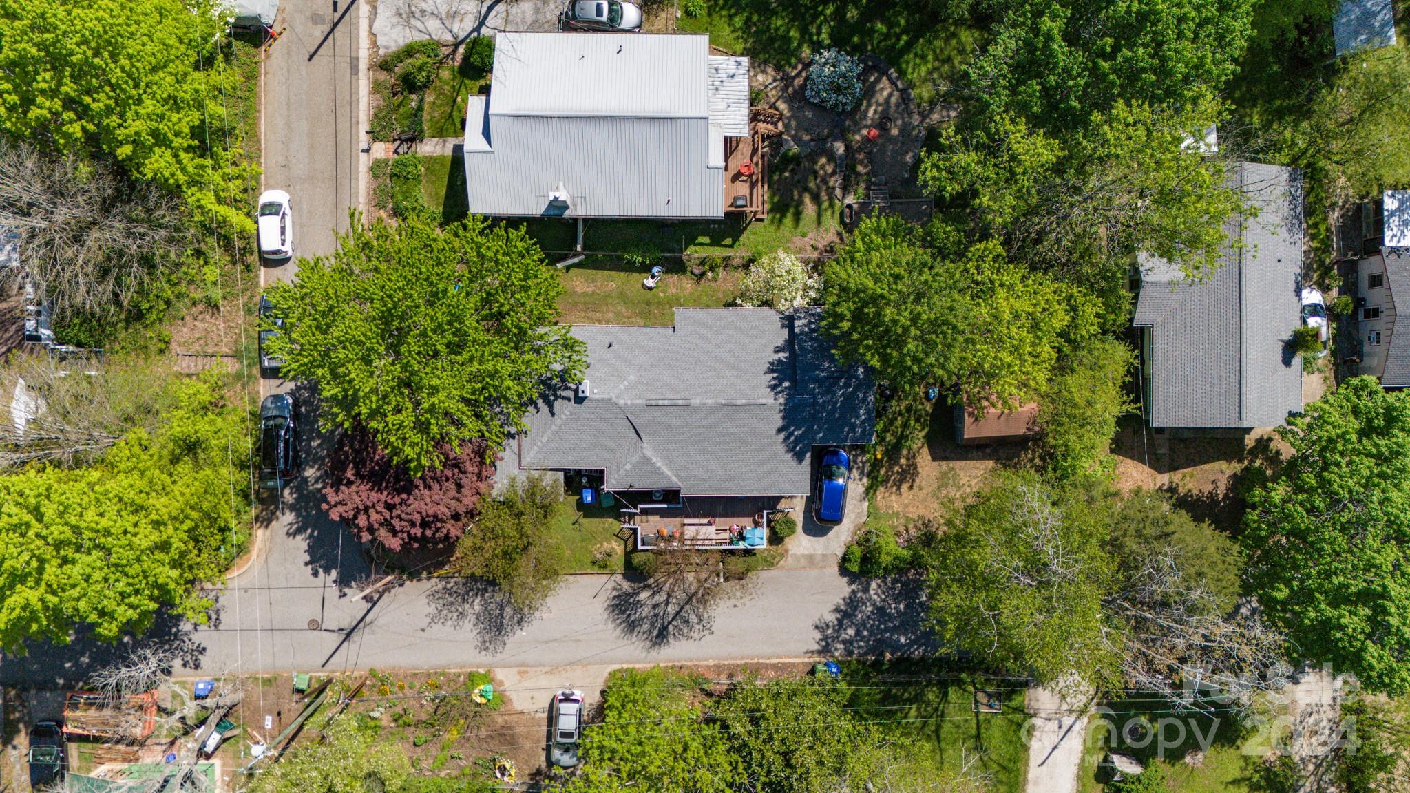 1 Westgate Road Asheville, NC 28806 - Photo 10 of 25 an aerial view of a house with a garden
