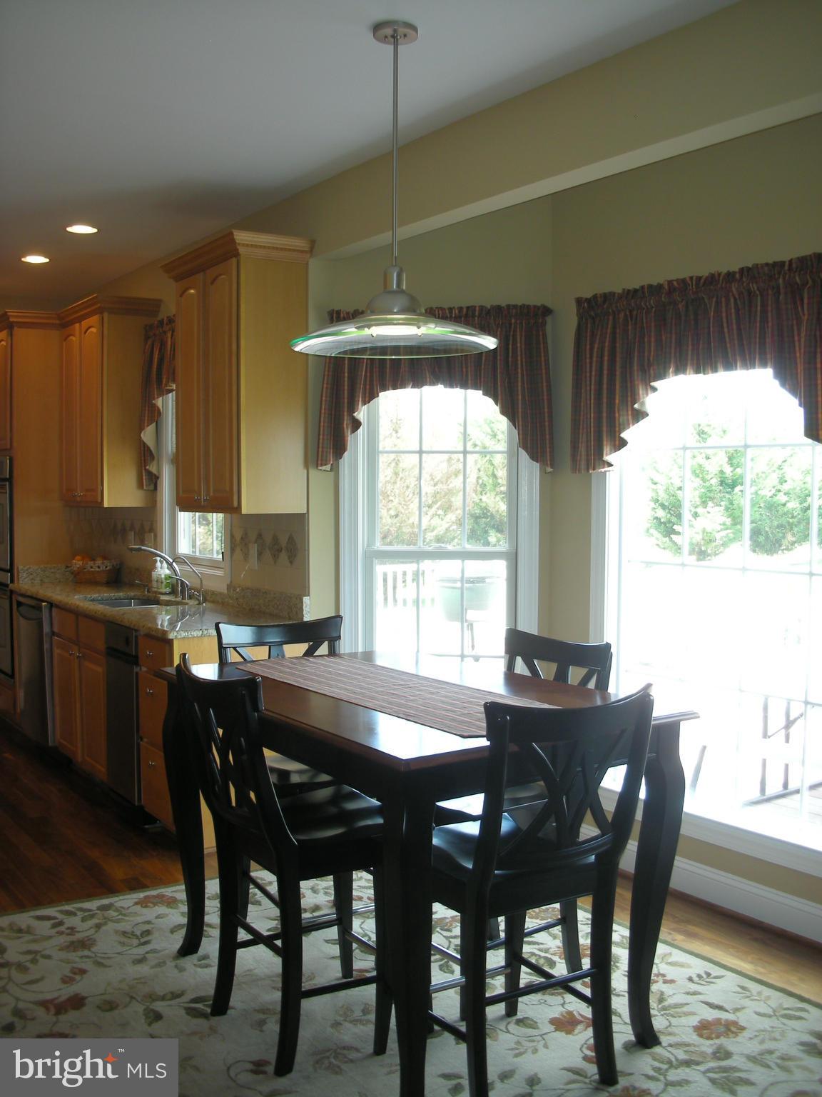 14222 Hicksville Road Clear Spring, MD 21722 - Photo 7 of 30 Breakfast Area between Kitchen & Family Room