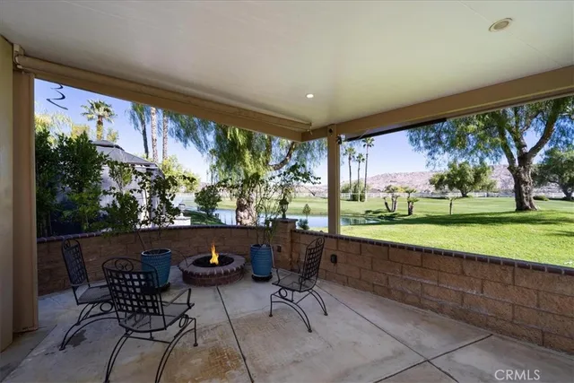 a room with furniture and a large window