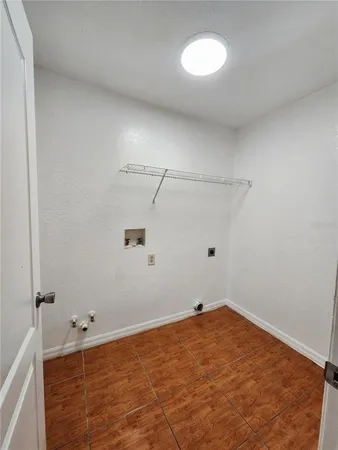 a view of a room with an empty space
