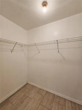 a view of a room with racks on the wall