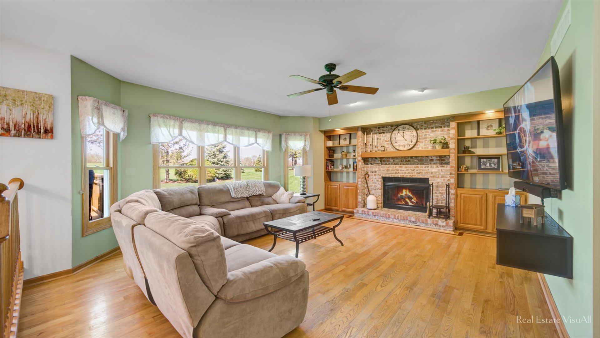 1808 Edgewood Drive Algonquin, IL 60102 - Photo 13 of 39 a living room with furniture and a fireplace