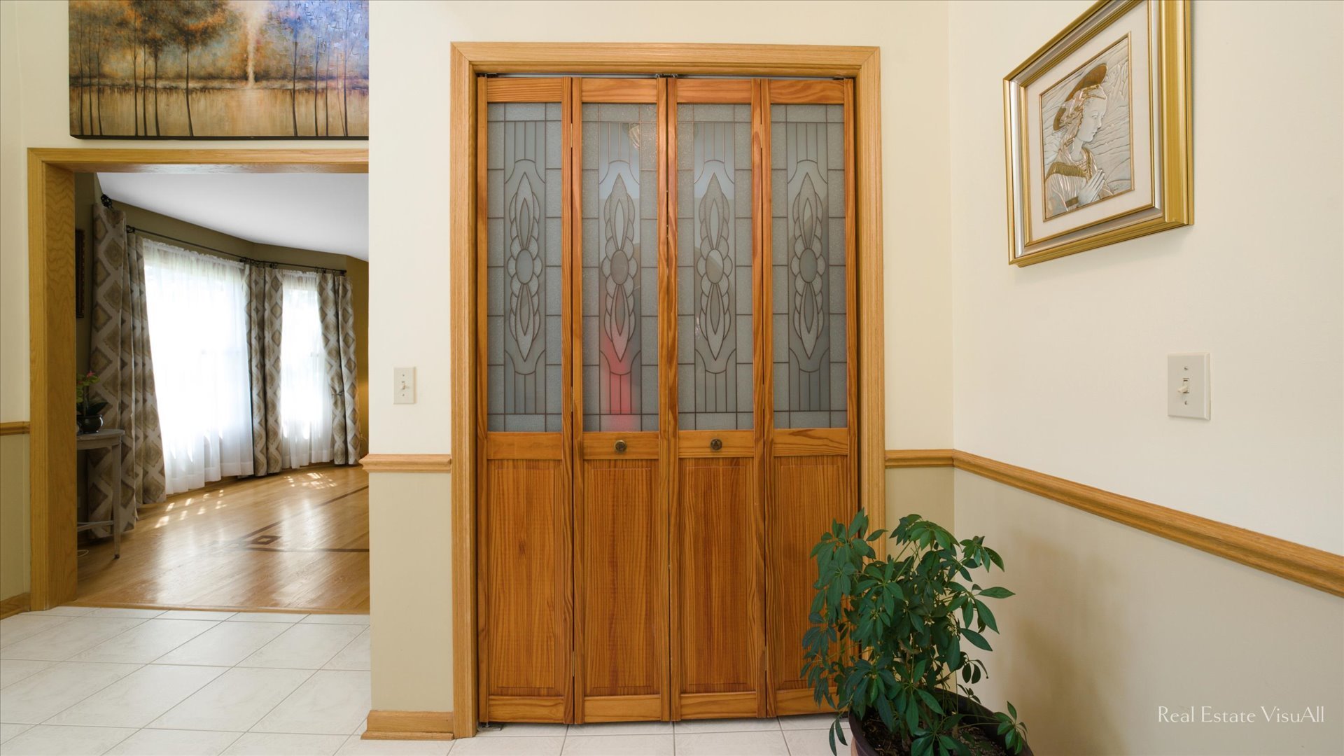 1808 Edgewood Drive Algonquin, IL 60102 - Photo 5 of 39 a view of a hallway with wooden floor and stairs