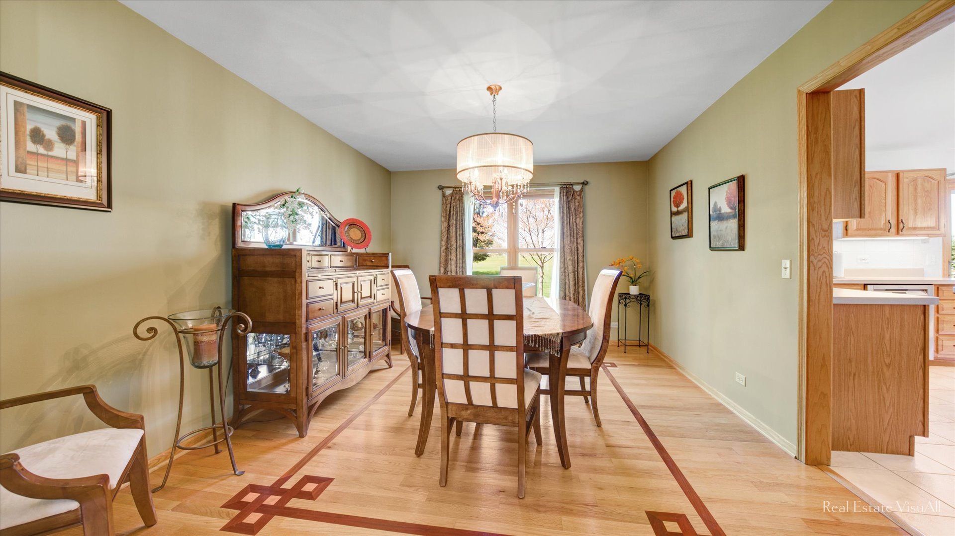 1808 Edgewood Drive Algonquin, IL 60102 - Photo 9 of 39 a view of a dining room with furniture window and wooden floor
