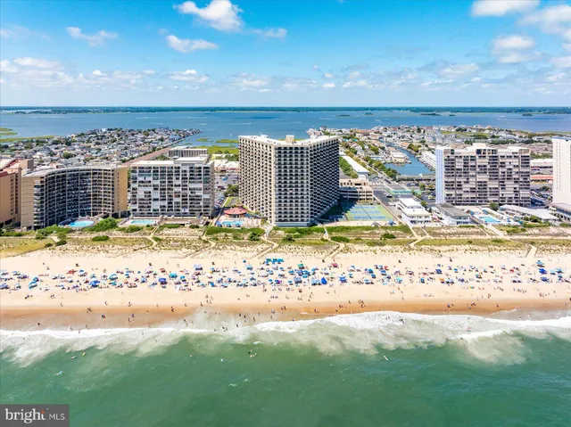 a view of a balcony dining area with furniture