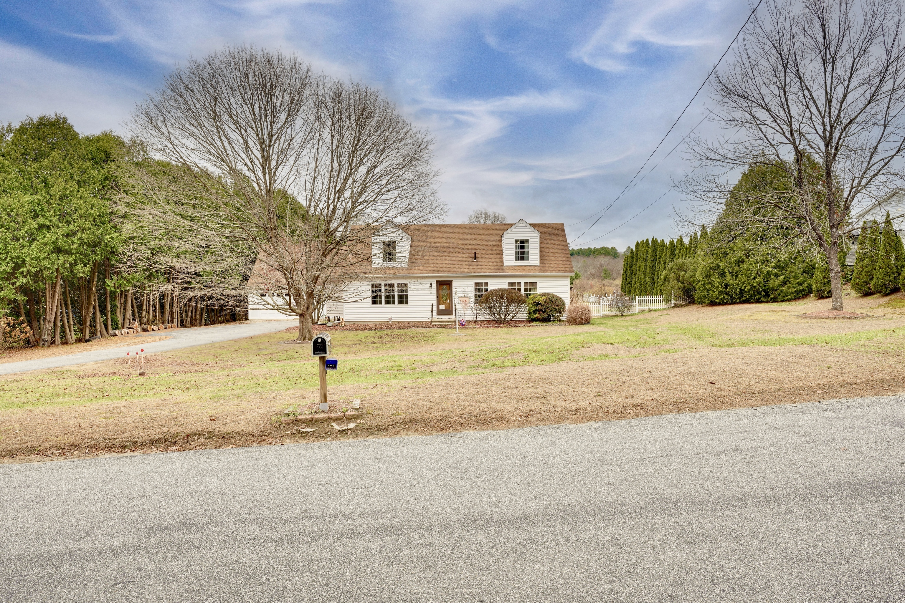 85 Bailey Woods Road Brooklyn, CT 06234 - Photo 2 of 35 a house with trees in front of it