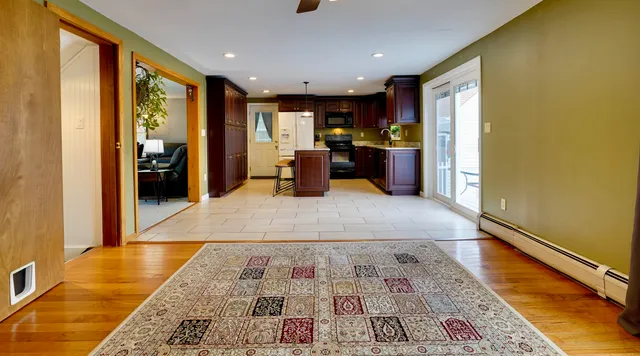 a view of a bathroom with mirror